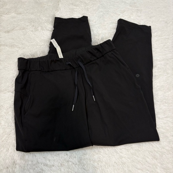 Lululemon On The Fly Pant 28” Black 8 - Picture 2 of 5